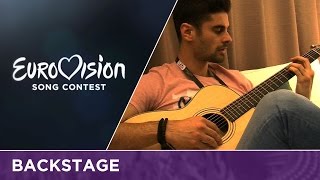 Freddie (Hungary) plays Pioneer on his guitar