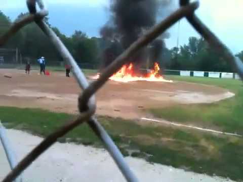 High School Coach Gets Placed On Admin Leave For Lighting Baseball Field On Fire To Dry It