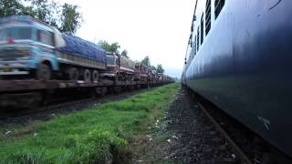preview picture of video 'GOC WDG 4 # 12828 RO RO crossing my Mandovi at Kankavali station'