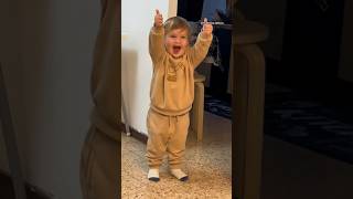 Toddler figures out how to give a thumbs up #shorts
