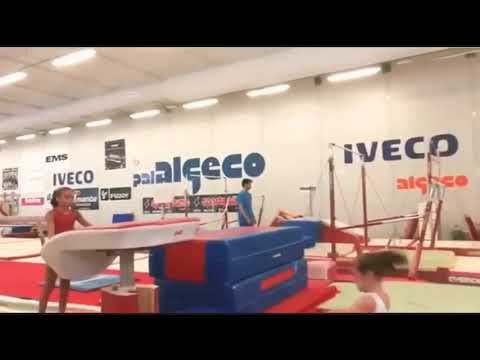 Asia D’Amato training Silivas and Layout mount,Angela Andreoli training Tsukahara dismount from beam