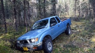 preview picture of video 'Alaskan Adventures: Toyota Tacoma with firewood fell in hole'