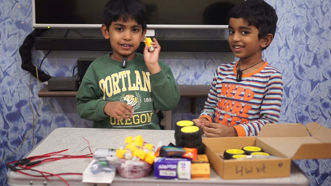 6 yo explains DC motors, controller, batteries, switch and connector.