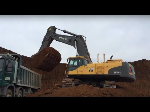 Volvo EC700CL Excavator Loading Mersedes Actros Trucks