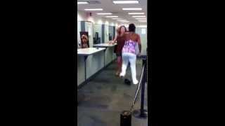 Lady Wallops Another Lady at the Bank