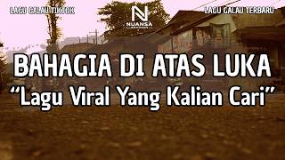Download lagu LAGU GALAU VIRAL TERBARU | 'BAHAGIA DI ATAS LUKA' (LIRIK VIDEO 2026) mp3