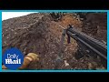 Ukrainian soldiers take Russian trench in terrifying POV footage from Bakhmut
