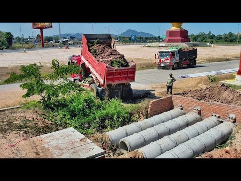 Dropping soil buried twin drainage system in front of the entrance to the house.