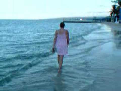 Lesley walking on the beach