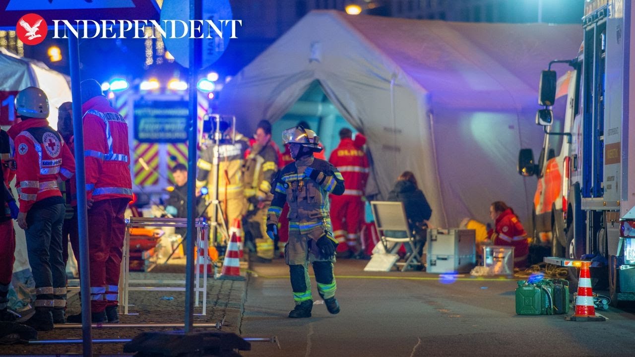 German town mourns victims of Christmas market attack with flowers