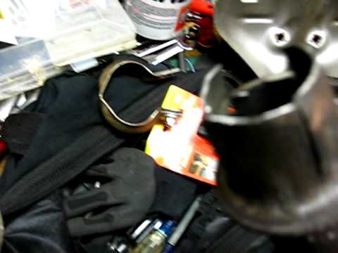 Install exhaust system on a 2000 Toyota Corolla.