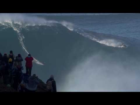 Surfer Takes On One Of The Biggest Waves We've Ever Seen