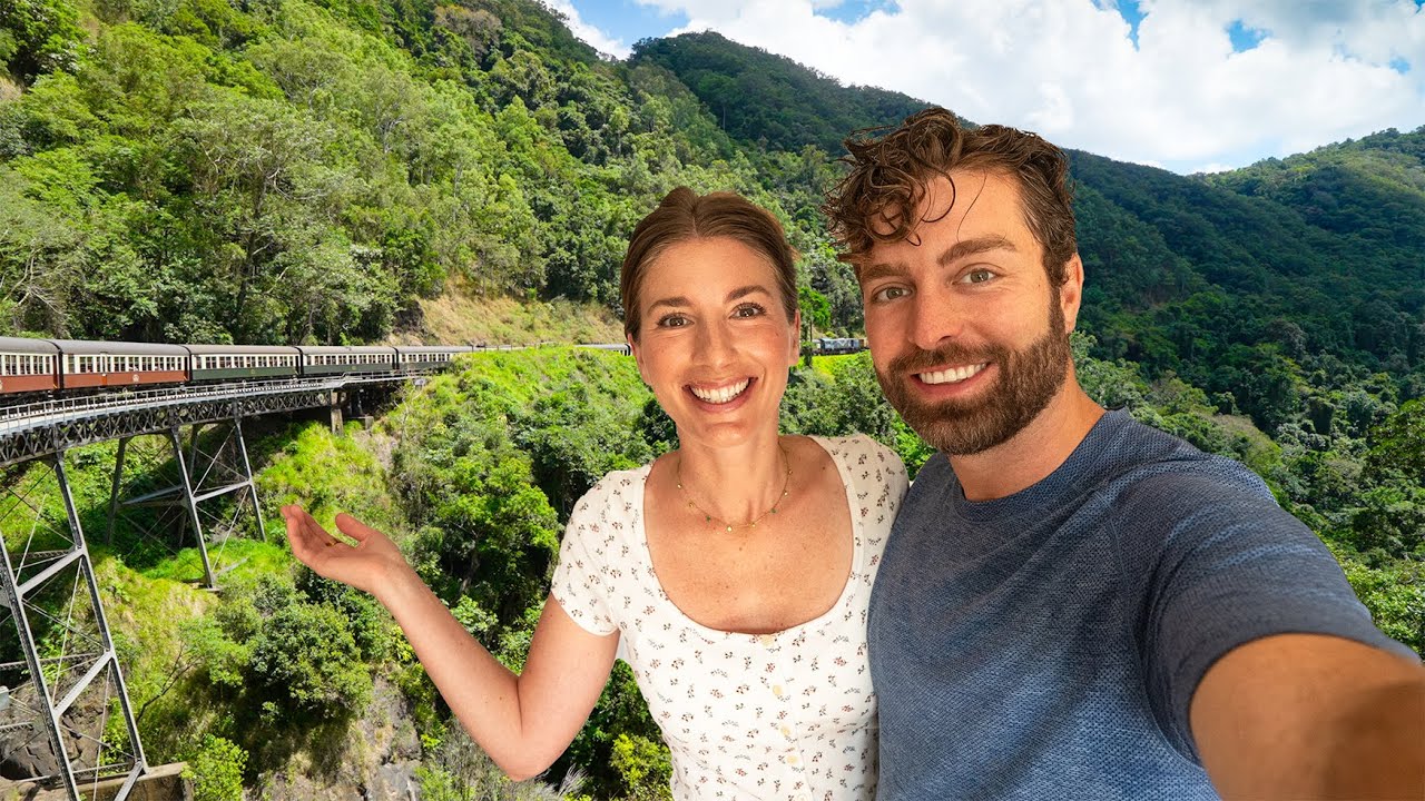 A duo heads to Kuranda via Kuranda Scenic Railway.