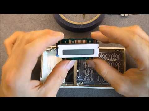 Vintage Sharp Elsimate EL 214 calculator reassembly
