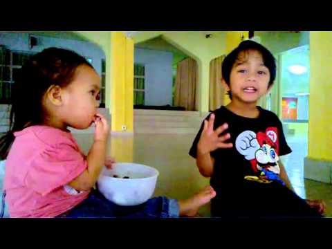 Jihad Adlee & Lily Adleen eating cake