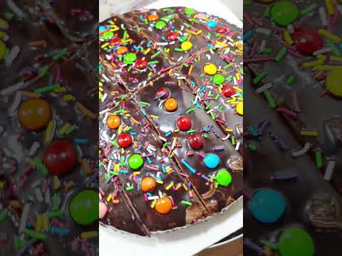 chocolate cake with bunties and sugar sprinkles#kids favorite@byShagufta munir