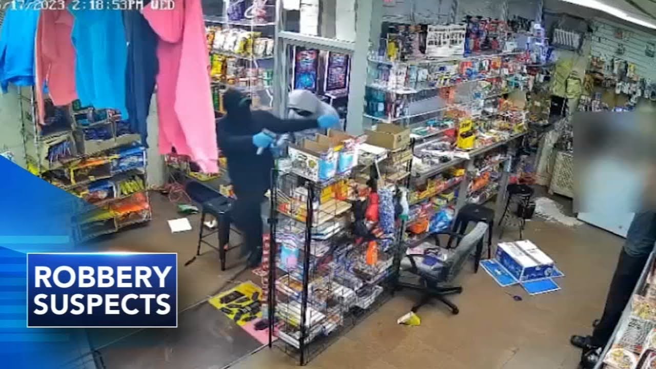 Suspects armed with ax, gun wanted in grocery store robbery