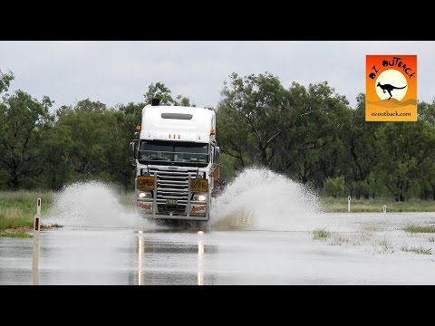 Road Trains crossing flooded river