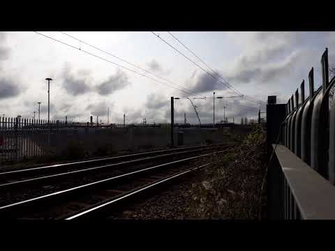37407'Blackpool Tower'& 37402'Stephen Middlemore'passing thorpe junction on 21/4/21
