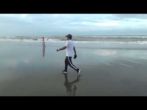 Walking on the beach in the morning