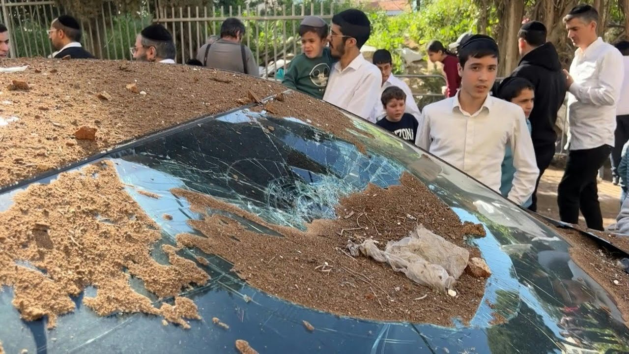 Video | Ultra-Orthodox Jews in Bnei Brak inspect damage after Iranian missile attack | AFP