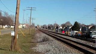 preview picture of video 'UPY 1302 LEADS THE MARSH JOB THRU WEST ALLIS.  IT FOLLOWED THE COAL TRAIN 3-26-09.MOV'