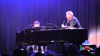 it's a small world performed by Alan Menken and Richard Sherman at the 2013 D23 Expo