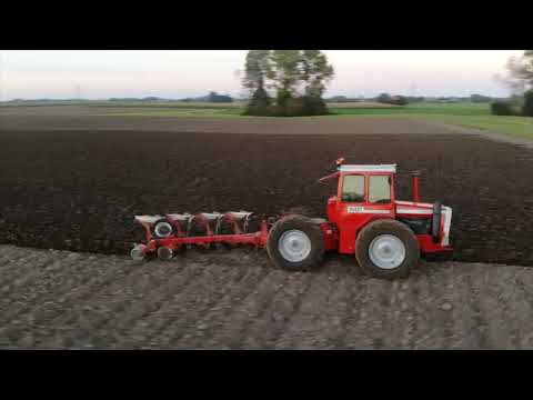 Massey ferguson 1250 plowing the field