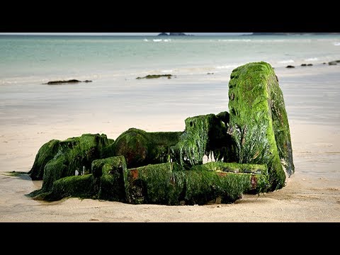 Land Rover emerges from Cornish beach 30 years after sinking