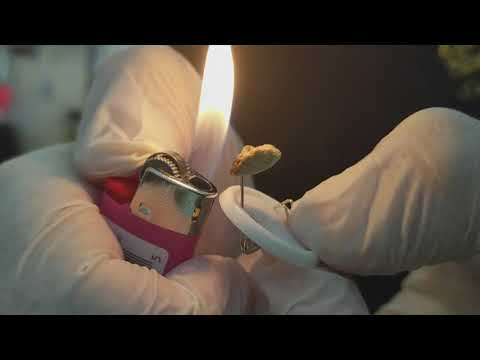 Smoking hash with a pin, old school style.