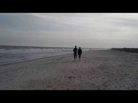 Huntington Beach SC, Tyler and Jaina walk on the beach March 2014