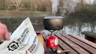 Sunrise camp coffee by a lake
