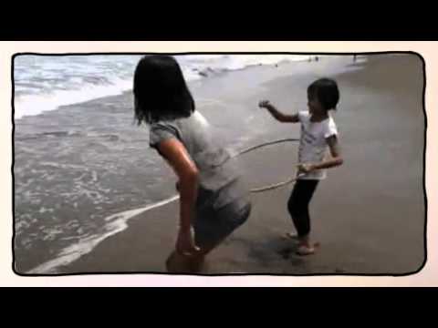 Melva playing in the beach  (Created with Magisto)