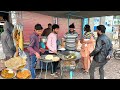 60 Rs THE MOST COMMONLY EATEN BREAKFAST IN PAKISTAN AL MAJEED HALWA CHOLE PURI STREET FOOD PK