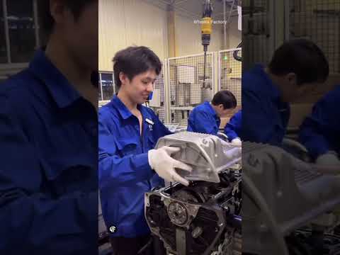 Thumbnail for Chinese workers assemble engines for SAIC-GM-Wuling Automobile by Automobile, SAIC-GM-Wuling Automobile, SAIC-GM-Wuling