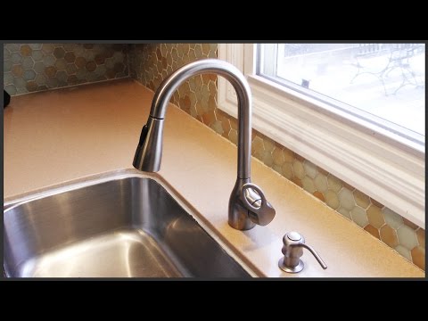Removing Hard Water Deposits From A Faucet Head