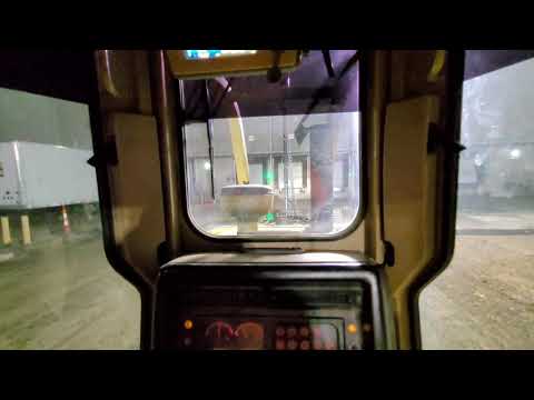 Fine grading  cement treated stone and Reembering C C Thomas