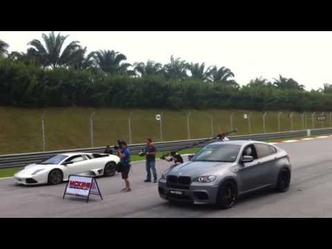 BMW X6 M vs Lamborghini Murciélago LP640