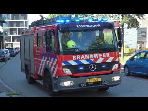Brandweer Middelburg-Rooseveltlaan TS 19-4535 met spoed naar een Woningbrand in Middelburg