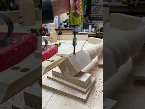 Part of a video titled Here is how I add hanger bolts to table legs during the assembly process.