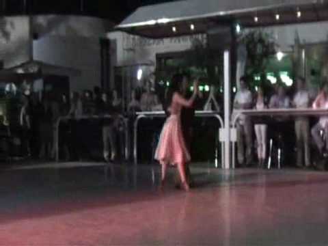  Pamela Ramos Aracena  and  Carlos Espinoza  are  dancing  to  the  tango  "  Sinsabor  "