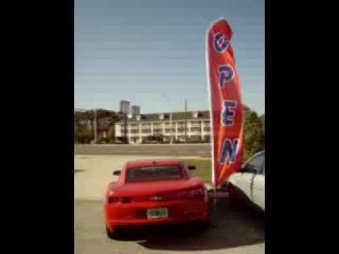 OPEN Car dealer swooper feather banner flag in action!