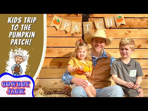 Family posing at a pumpkin patch with dad and two kids in front of a wooden backdrop and a PATCH banner on the right; Cowboy Jack logo on the left panel.