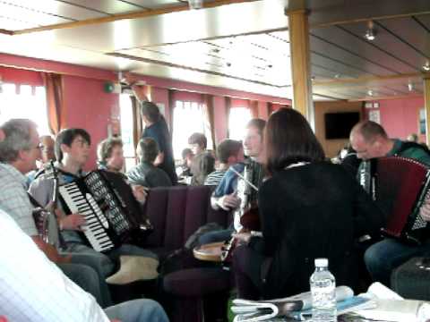 Three accordionists, one fiddler and a banjo player walk onto a ferry...