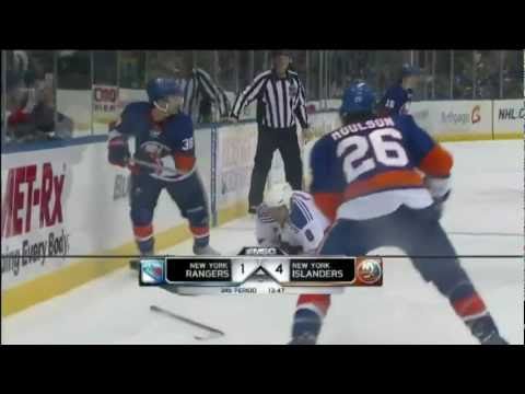 Jack Hillen hipchecks Brandon Prust