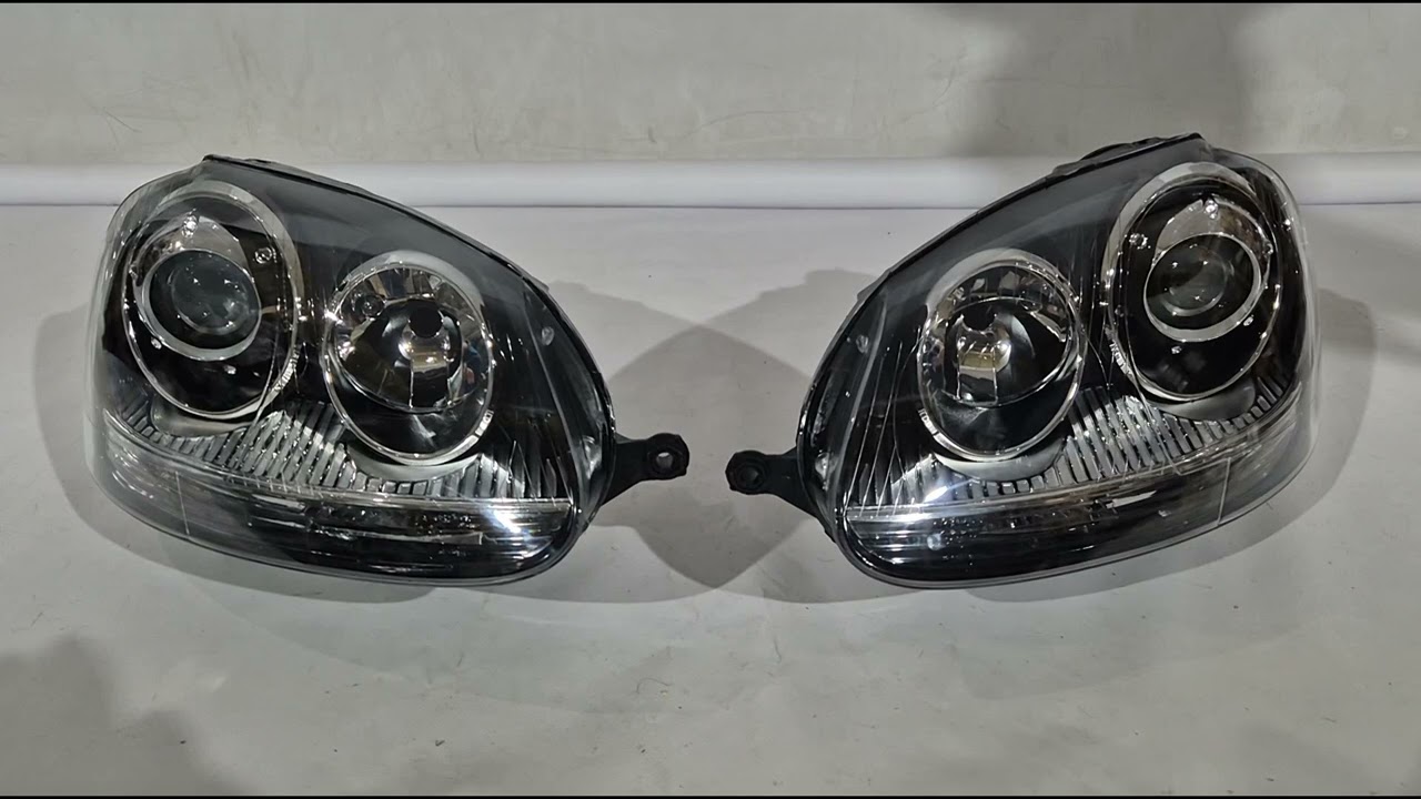 Volkswagen Golf 5 2003-2009 Front headlights with projector lens Black (2 pcs) Video 1