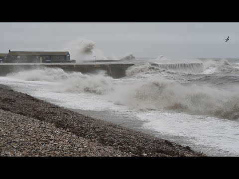 Storm Ashley Lyme Regis - Big waves crashing against the Cobb