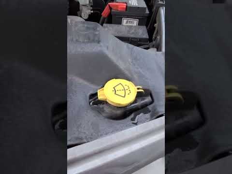 How to find the windshield washer fluid on a RAM