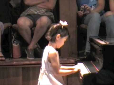 Iris, age 5, performing her first recital