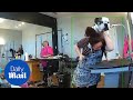 Hilarious Moment Dog Groomer Fends Off Bulldog Humping Her Back